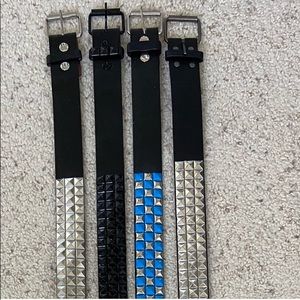 Leather belts black silver, white or blue accent.